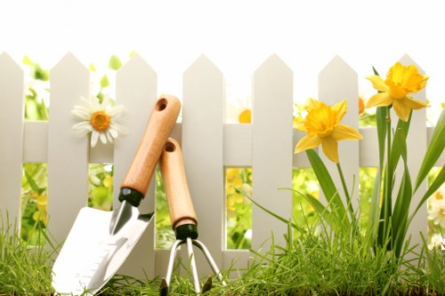 Steps, edging, and retaining features in a Hackney hard landscaping installation